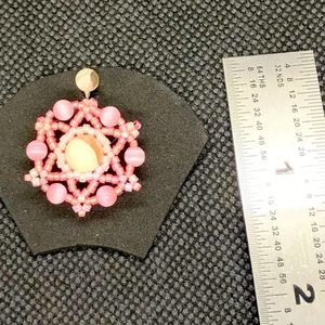 Flexible beaded belly ring/shield